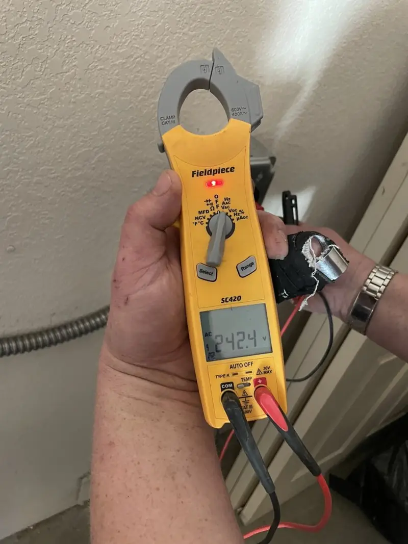 Voltage testing with clamp meter during Electrical Installation Services in Lake Dallas